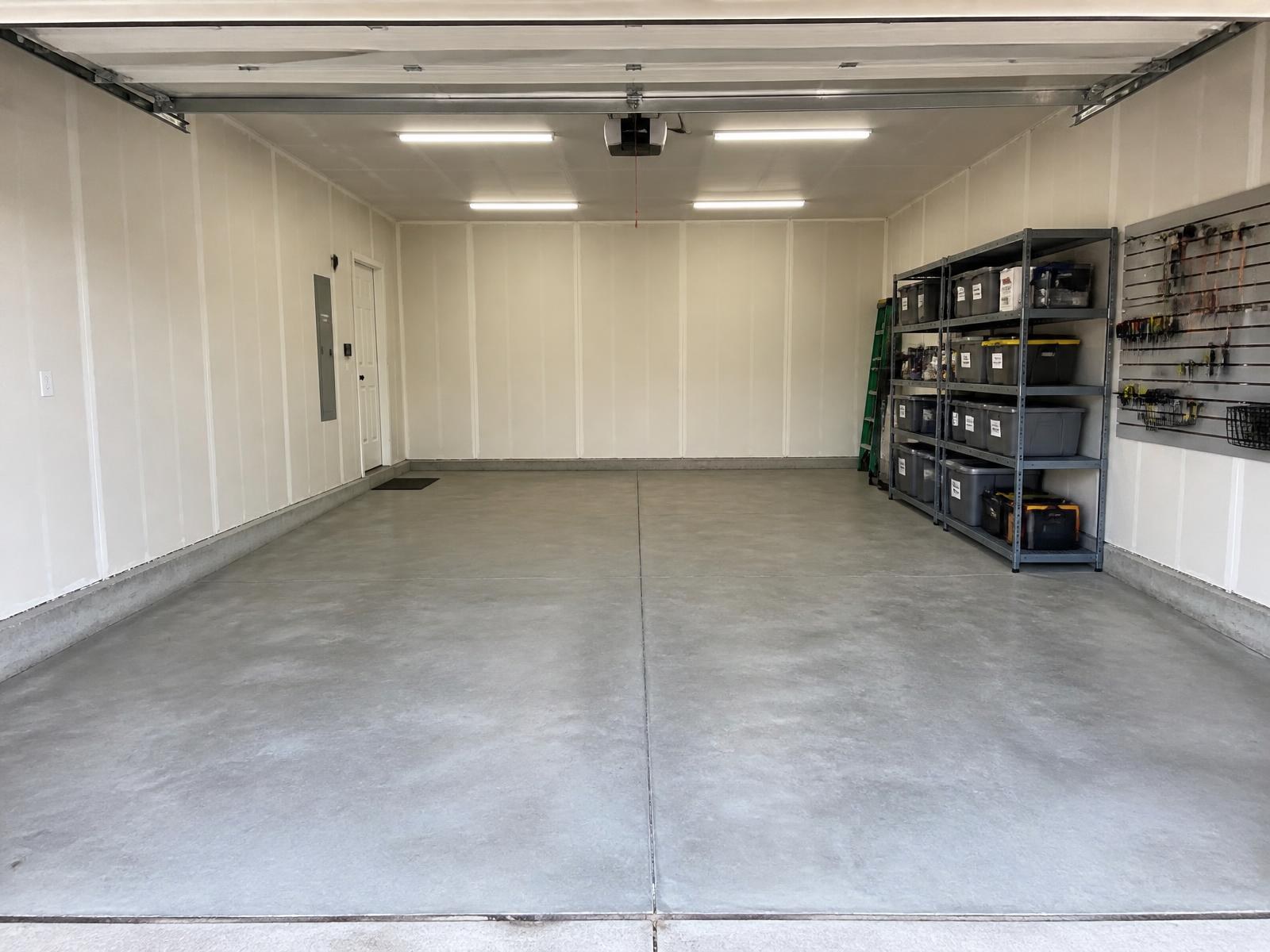 Illustrative Refresh package: garage cleanout, a single storage zone, and LED lighting — after